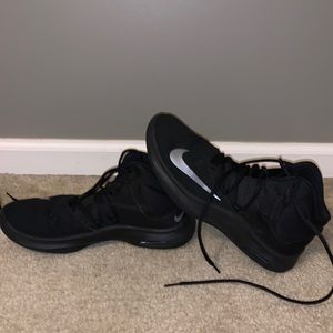 Black Nike basketball shoes